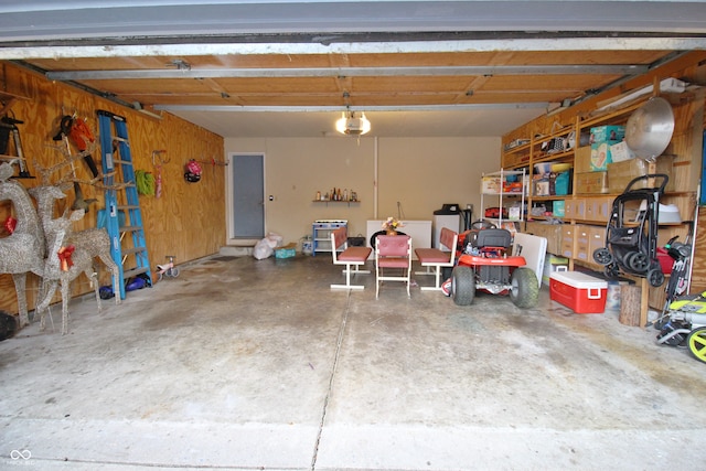 garage with wood walls