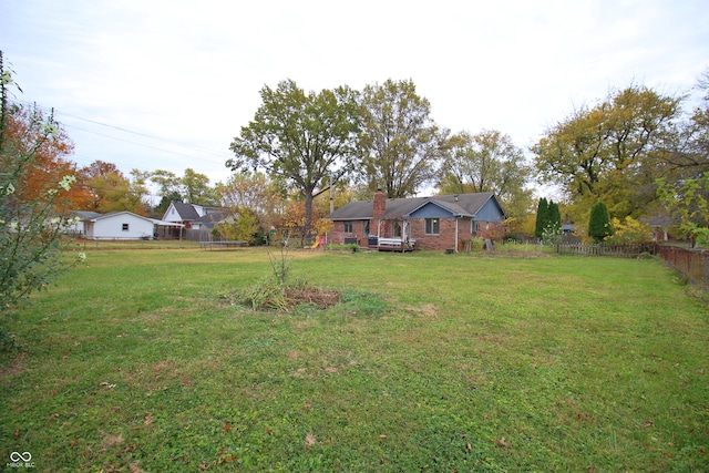 view of yard featuring a deck