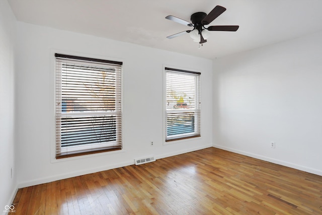 unfurnished room with light hardwood / wood-style floors and ceiling fan