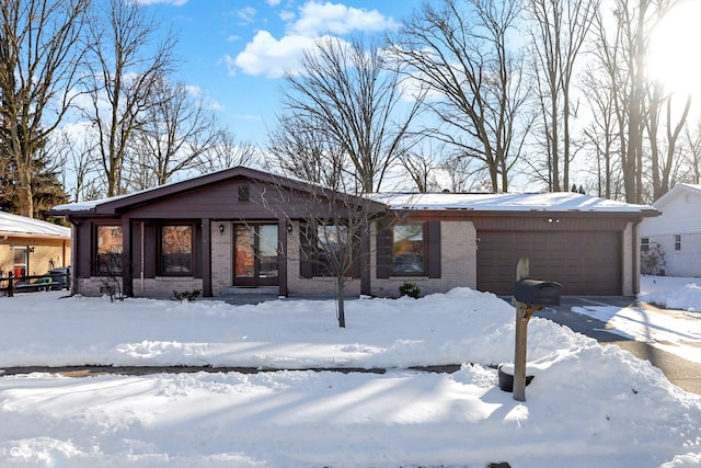 single story home featuring a garage