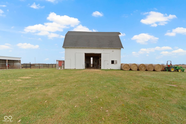 view of outdoor structure featuring a yard