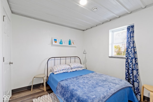 bedroom with hardwood / wood-style floors