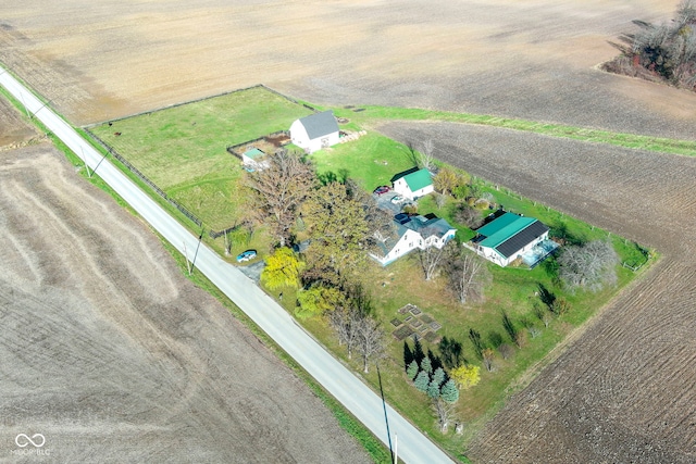 birds eye view of property featuring a rural view