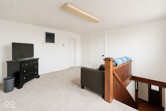 living area with carpet