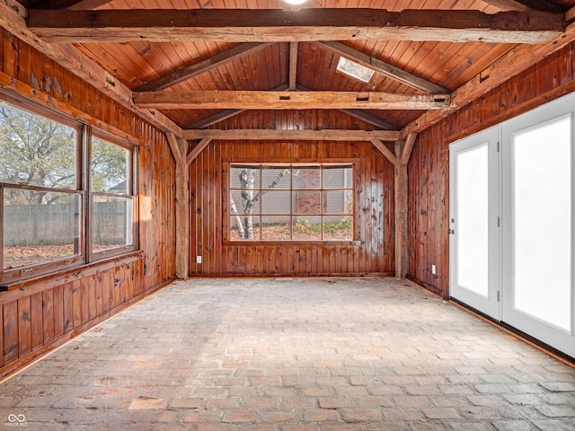 unfurnished sunroom with wooden ceiling and lofted ceiling with beams