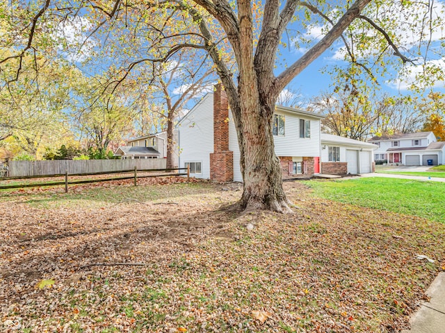 view of yard featuring a garage