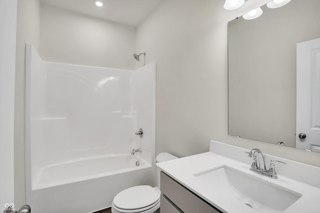 full bathroom with toilet, vanity, and shower / bathing tub combination