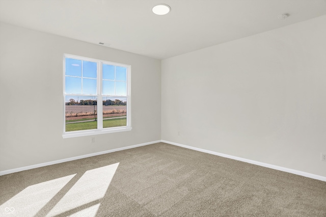 empty room featuring carpet flooring