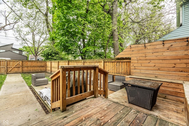 deck featuring a fenced backyard