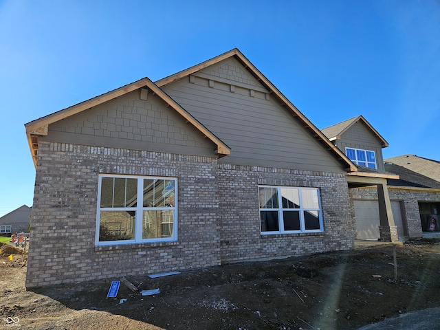 view of home's exterior featuring a garage