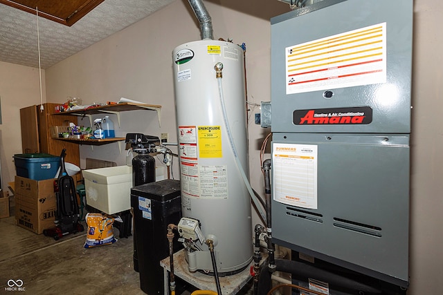 utility room featuring heating unit and water heater