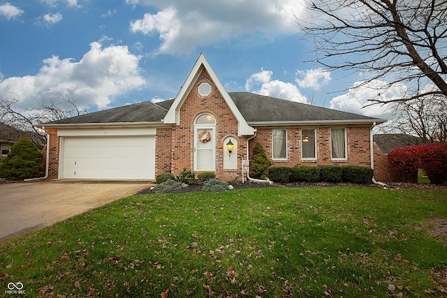 view of front facade with a front yard and a garage