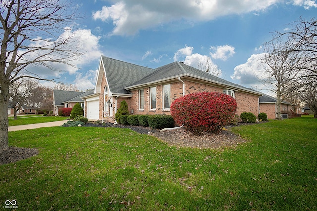 view of property exterior featuring a yard and a garage