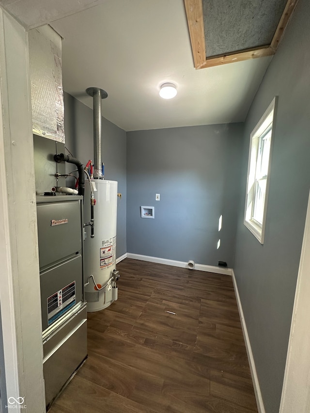 utility room featuring gas water heater