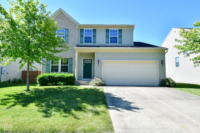 view of front facade with a garage and a front lawn