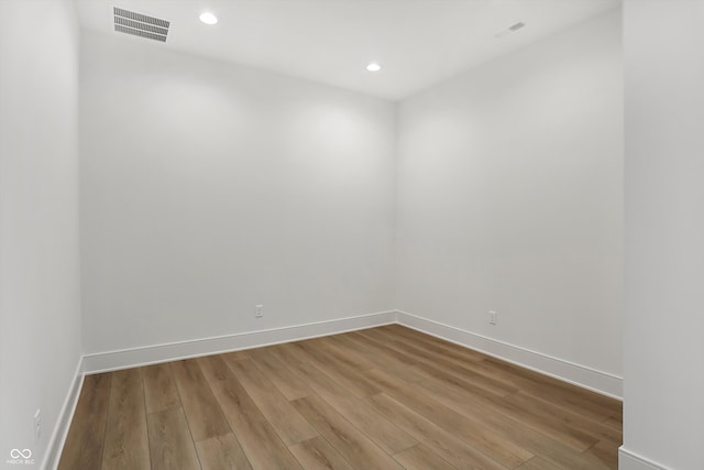 unfurnished room featuring light hardwood / wood-style floors