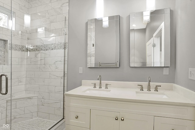 bathroom with vanity and an enclosed shower