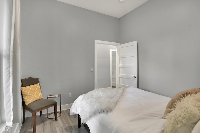 bedroom with light wood-type flooring