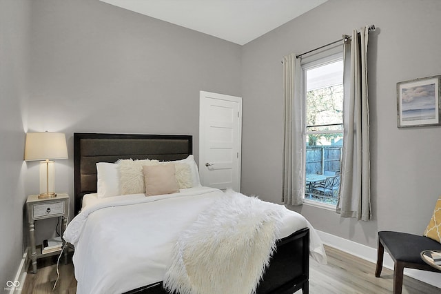 bedroom featuring hardwood / wood-style flooring