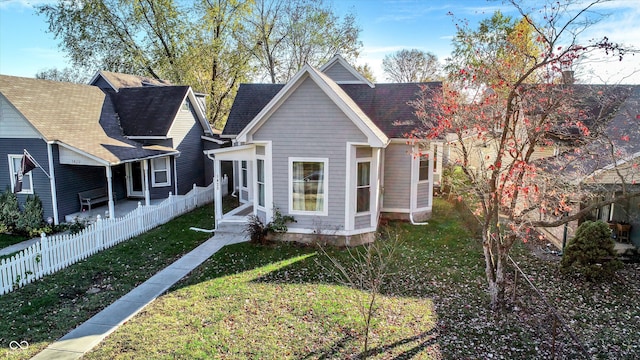 bungalow with a front lawn