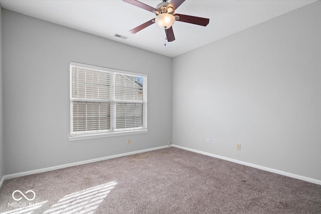 unfurnished room featuring carpet flooring and ceiling fan