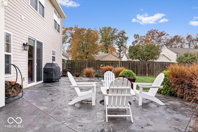 view of patio with a grill