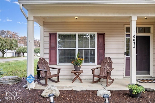 view of patio featuring a porch