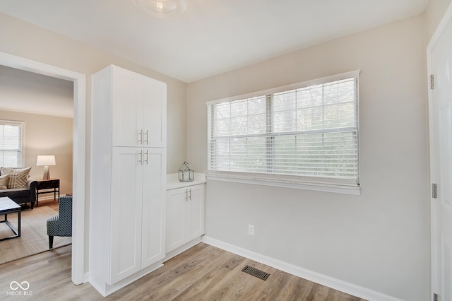 4902 N Capitol Ave, Indianapolis, IN 46208 - interior space with light wood-style flooring and baseboards