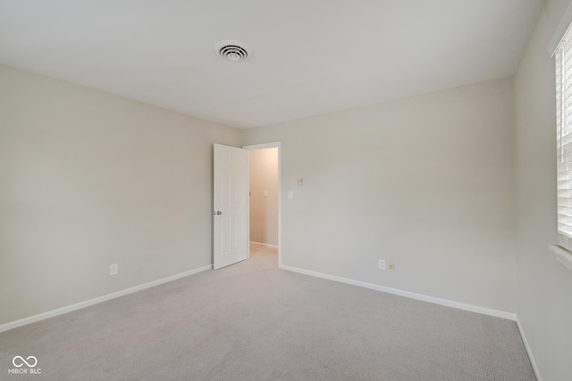 4902 N Capitol Ave, Indianapolis, IN 46208 - carpeted spare room with baseboards