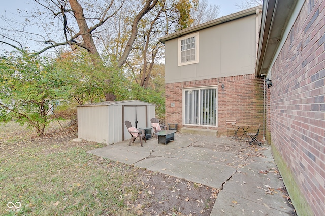 view of patio / terrace featuring a storage unit