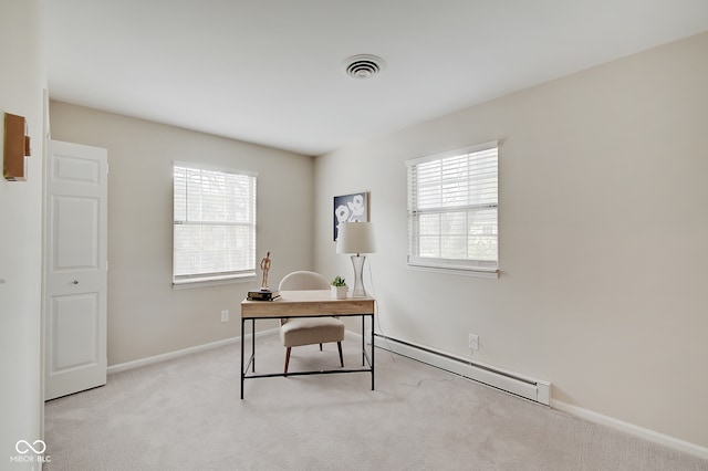 carpeted home office featuring a baseboard heating unit