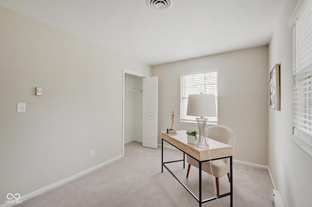 4902 N Capitol Ave, Indianapolis, IN 46208 - home office with light colored carpet, baseboards, and baseboard heating