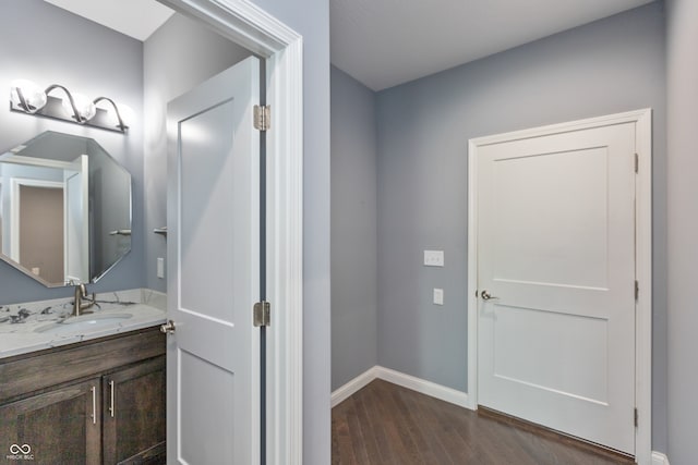 bathroom featuring vanity and wood-type flooring