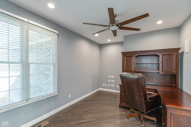 office with ceiling fan and dark wood-type flooring