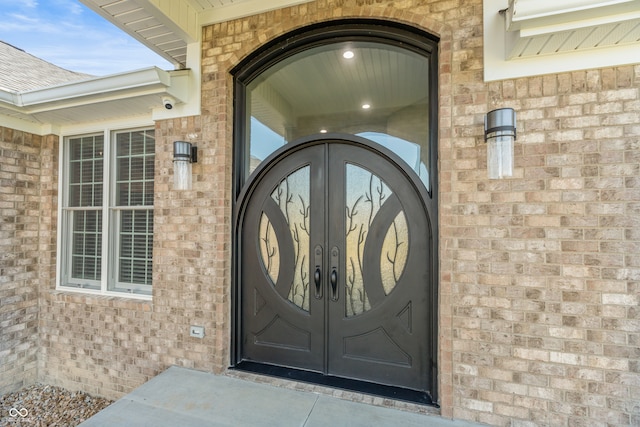 entrance to property featuring french doors