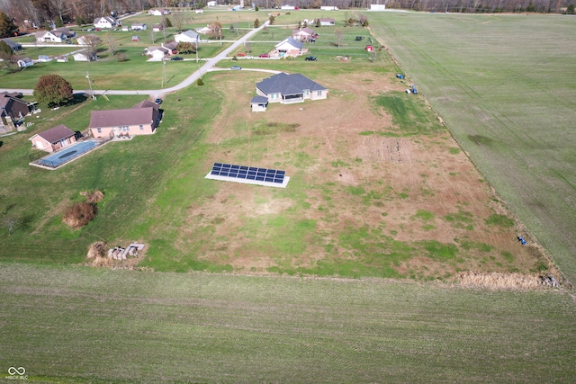 birds eye view of property featuring a rural view