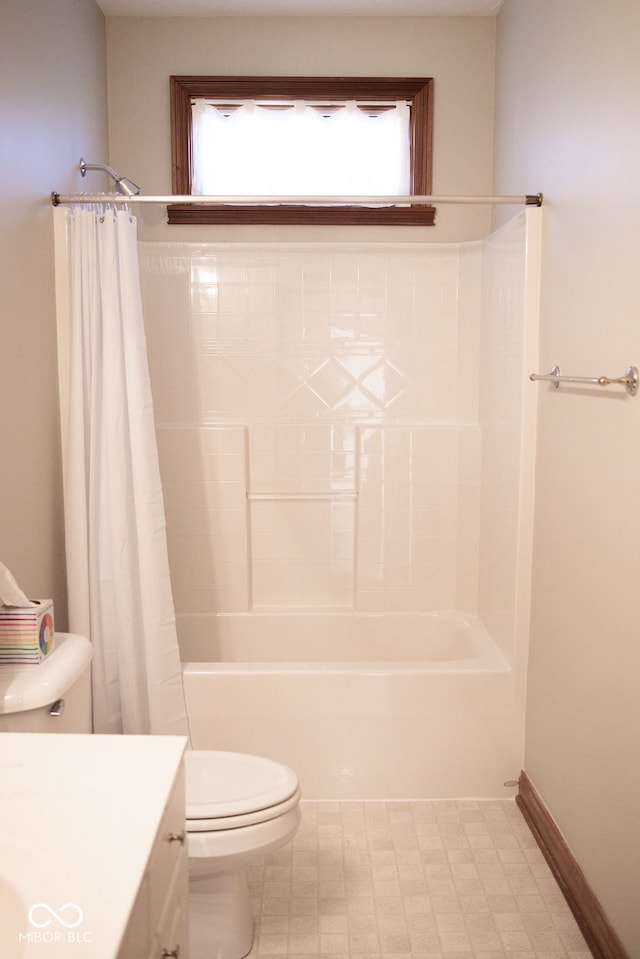 full bathroom with vanity, toilet, and shower / bath combo with shower curtain