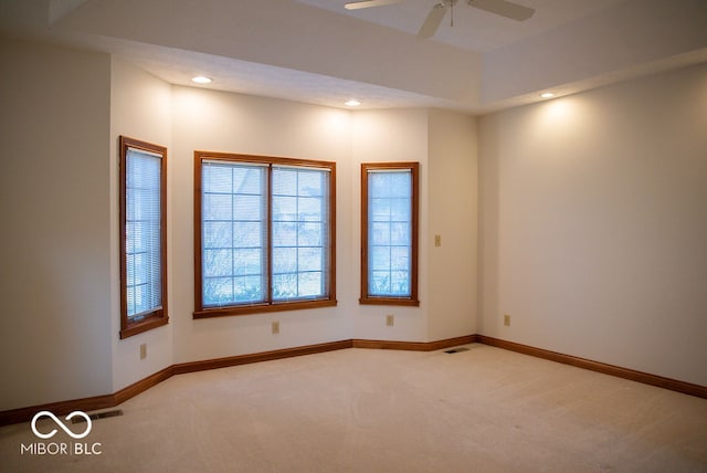 carpeted empty room with ceiling fan