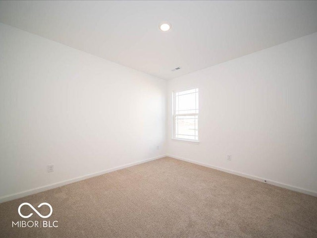 view of carpeted spare room