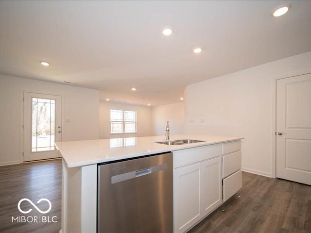 kitchen featuring a healthy amount of sunlight, sink, a center island with sink, dishwasher, and white cabinetry