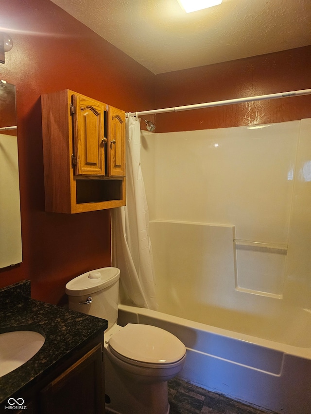 full bathroom featuring toilet, shower / tub combo, and vanity