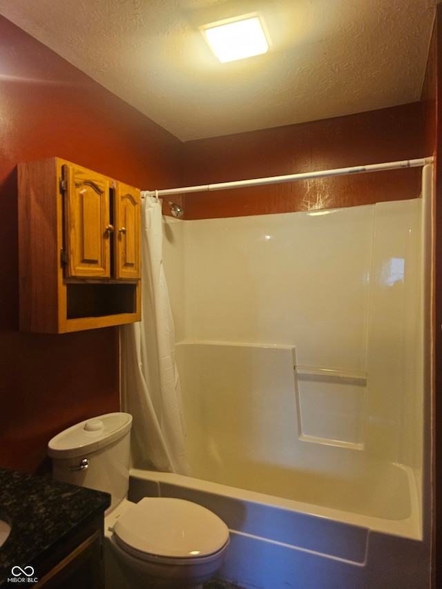 full bathroom featuring vanity, a textured ceiling, toilet, and shower / tub combo with curtain