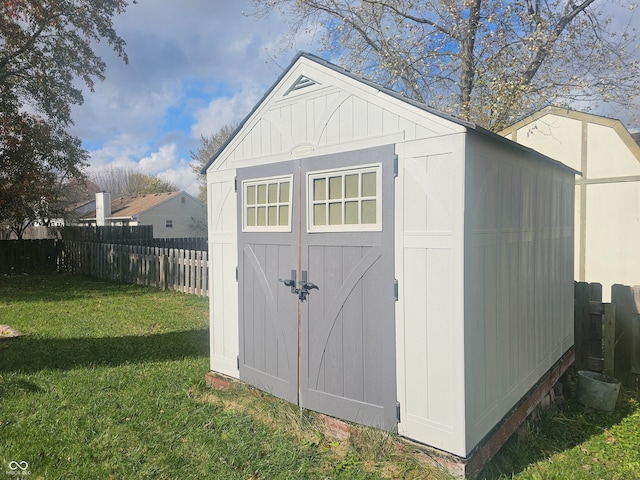 view of outdoor structure with a yard