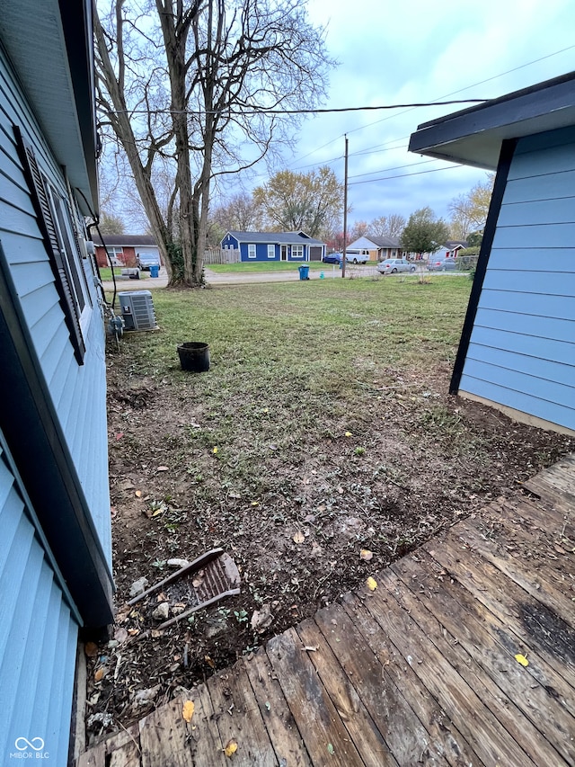 view of yard featuring a wooden deck