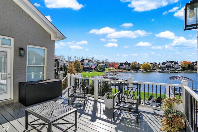 wooden deck with a water view