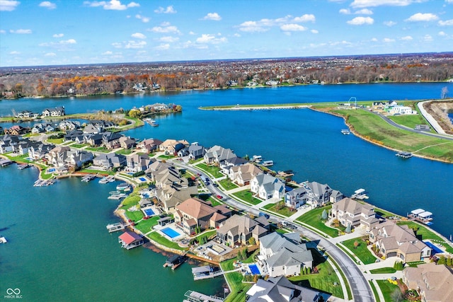 birds eye view of property featuring a water view