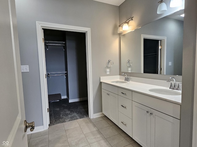 bathroom featuring vanity and tile patterned flooring