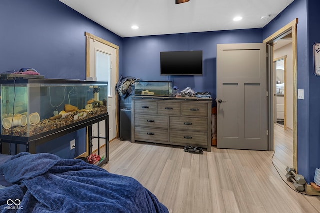 bedroom featuring light hardwood / wood-style floors