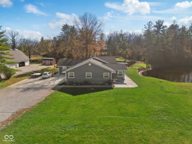 view of home's exterior with a yard