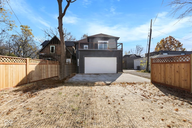 1514 E 12th St, Indianapolis, IN 46201 - view of front facade featuring driveway and a garage